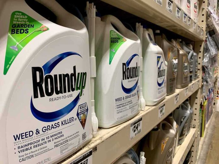 1649379367 featured image Roundup weed killer bottles on store shelf