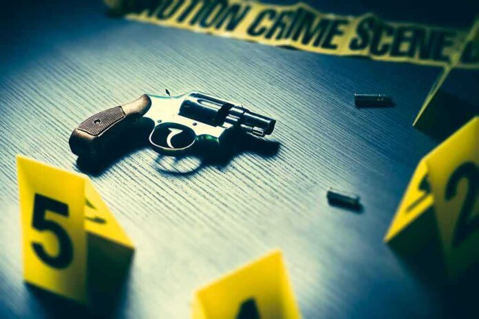 616493339 featured image Revolver on table with crime scene markers
