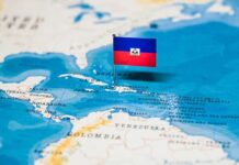 Haitian flag placed on a map of the Caribbean.