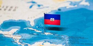 Haitian flag placed on a map of the Caribbean.