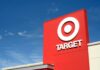 exterior of a Target shopping center with blue sky behind it.