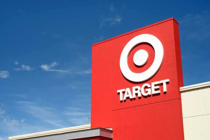481641556 featured image exterior of a Target shopping center with blue sky behind it.