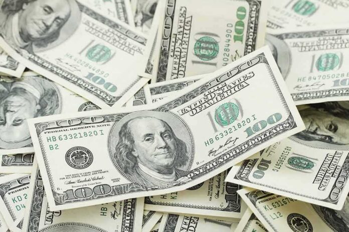 150954545 featured image Pile of US hundred dollar bills