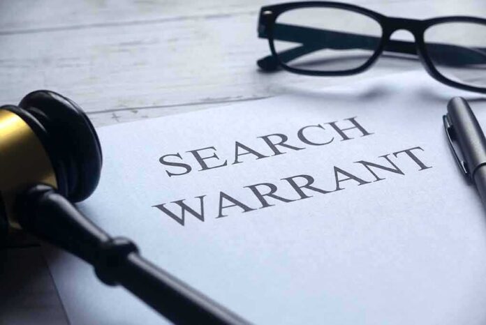 1776230939 featured image Search warrant document with gavel and glasses