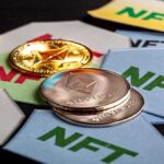 Ethereum coins on NFT cards background