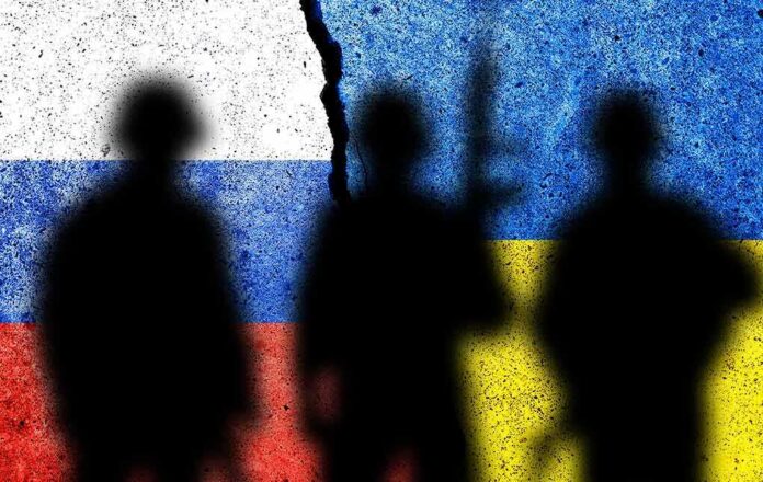 2095910923 featured image Silhouetted soldiers with Russian and Ukrainian flag backgrounds