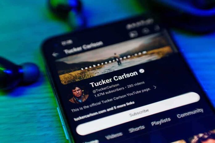 2432183551 featured image Smartphone displaying a YouTube channel profile page