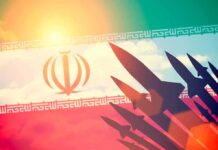 Silhouettes of missiles over Iran's flag graphic.