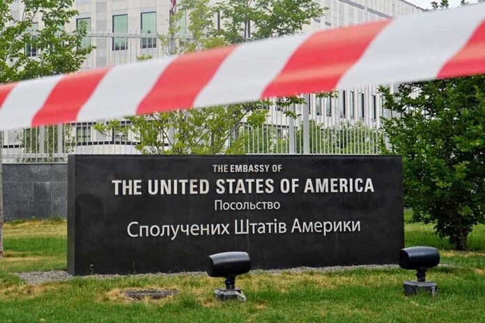 656626315 featured image U.S. Embassy sign behind red-and-white caution tape