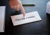 Envelope pointing finger