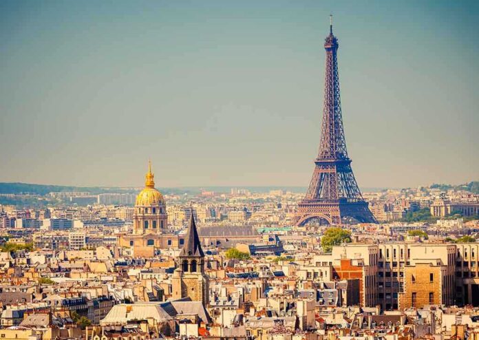 shutterstock_111362132.jpg A panoramic view of Paris featuring the Eiffel Tower and a golden dome