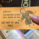 TRUMP THREATENS Funds Cut—Cashless Bail on the LINE Monopoly game card get out of jail free