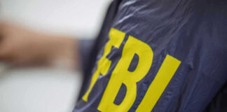 FBI jacket with yellow lettering.