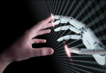 AI Creates Cancer-Killing “Heat-Seeking Missiles” Human and robotic hands almost touching fingers