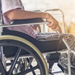 HORRIFYING Home Invasion Targets Paralyzed Man Close-up of a person sitting in a wheelchair with patterned pants
