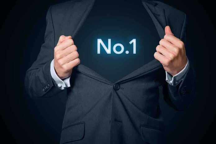 A businessman revealing a glowing No.1 symbol under his suit