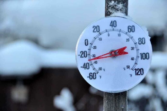 shutterstock_56412334.jpg Outdoor thermometer displaying a very low temperature in a snowy setting