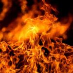 DEADLY Nursing Home BLAST Exposes Hidden TRUTHS Close-up of vibrant flames against a dark background