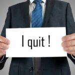 Democrat’s Exit Stuns Texas Senate Race A man in a suit holding a sign that says I quit!