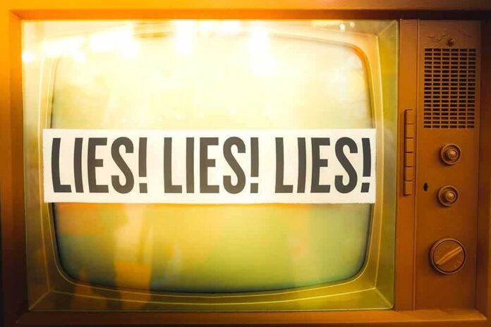 A vintage television displaying the repeated phrase 'LIES! LIES! LIES!'