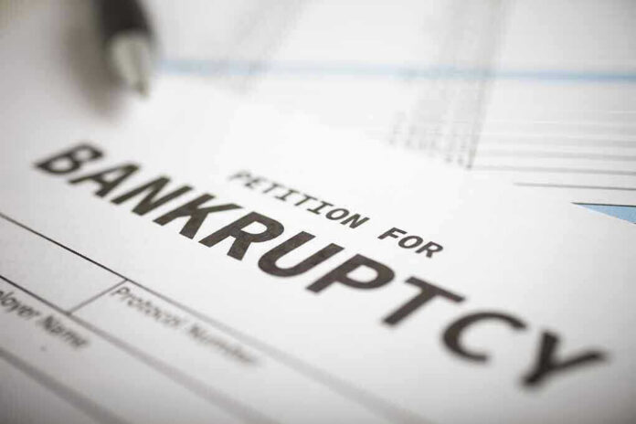 143336302 Petition for bankruptcy document with pen.