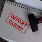 Trump’s NEW Tariff Bombshell–Unexpected TARGET Notebook with Import Tariff stamp and rubber stamper.