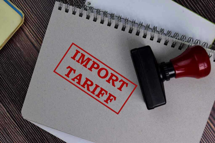 Notebook with Import Tariff stamp and rubber stamper.