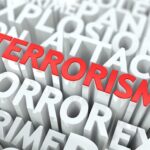 Severed Heads on Beach: Chilling Cartel Warning The word 'TERRORISM' prominently displayed in red among other related terms
