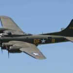 U.S. Bombers in CRISIS–Look WHO WILL Fix Them! Boeing B-17 flying against a clear blue sky