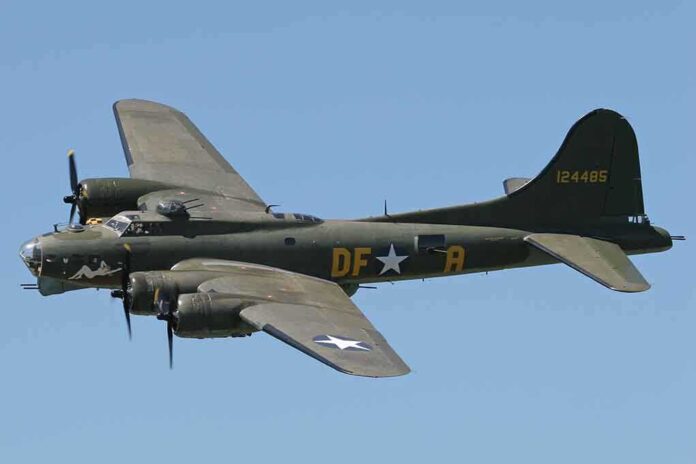 Boeing B-17 flying against a clear blue sky