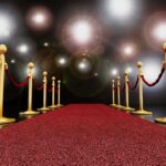 $75 Million Gamble PAYS OFF — HOLLYWOOD Elites Furious A red carpet lined with gold stanchions and ropes under bright spotlights