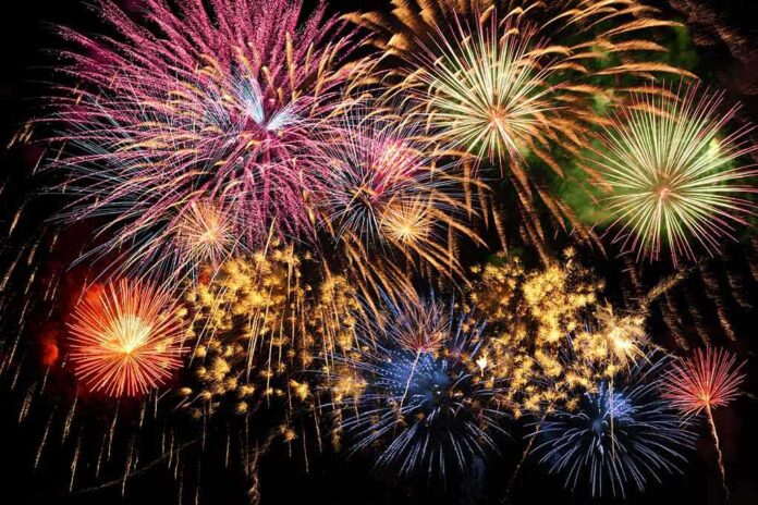 shutterstock_63405547.jpg Colorful fireworks exploding in the night sky