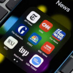 CNN’s Deleted Tweet Reveals Shocking Terrorism Bias News app icons on a smartphone screen.