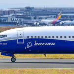 Airspace Chaos Turns Travel into High-Stakes Gamble Boeing 737-800 on airport runway with other planes.