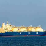 LNG tanker ship sailing on open sea.