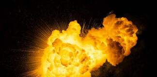 Bright, fiery explosion against a dark background.