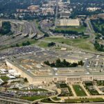 Aerial view of the Pentagon surrounded by highways and urban areas