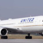 Hijack Code Triggers Midair Panic United Airlines plane on the runway.