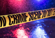 Arsonists IGNITE Themselves — Total FAIL! Yellow crime scene tape with police lights in background.