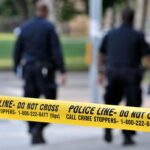 Florida’s 3-Day Highway Sweep Catches 249 Illegal Immigrants Police officers walking past caution tape at a crime scene