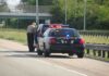 525 Lbs of Cocaine Found in Routine Traffic Stop Police officer conducting a traffic stop on a highway