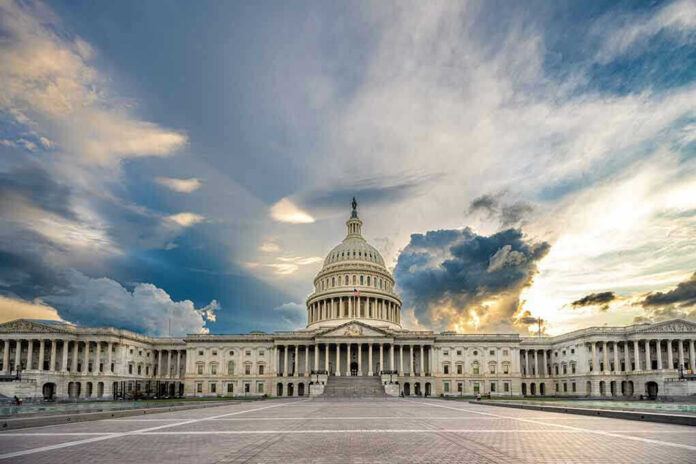 U.S. Capitol building with dramatic cloudy sky.