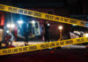 Multiple Shot At The Festival, Suspect at Large Yellow police tape in front of crime scene.