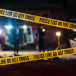 Multiple Shot At The Festival, Suspect at Large Yellow police tape in front of crime scene.