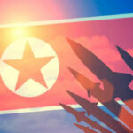 Missile Frenzy: North Korea Signals Hard Line North Korean flag with missile silhouettes.