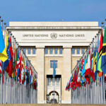 $300 Billion—Missiles Off-Limits? United Nations building with numerous national flags outside.