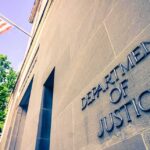 Migrant Child Sponsorship Fraud Exposes System Failures Exterior view of the Department of Justice building with an American flag