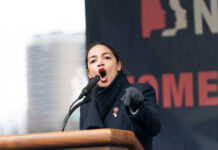 Archived Blog Posts Add New Context to Candace Woman speaking passionately at podium during outdoor event.