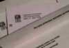 Judge Orders New Review of Trump IRS IRS letters and envelopes on a table.