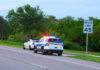 Man Fatally Struck After Fleeing ICE Agents in Florida Police car pulling over a white car
